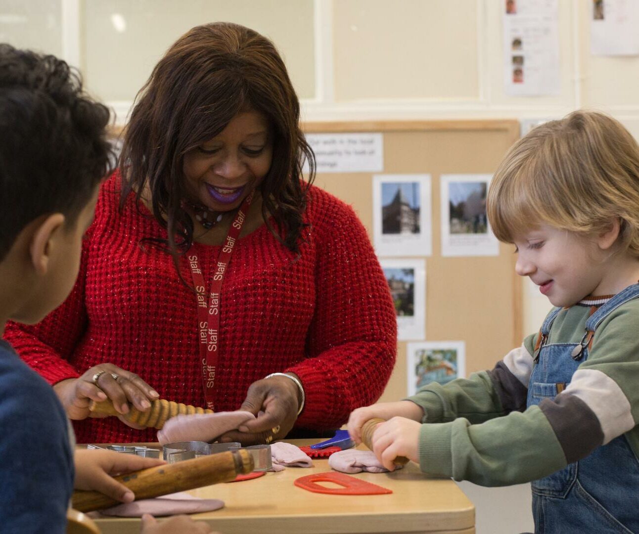 Staff and Child playing with playdough